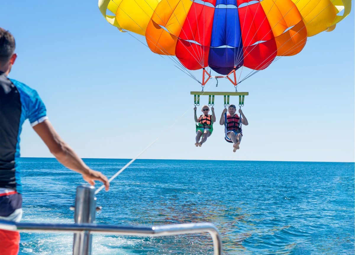 couple parasailing on Anna Maria Island